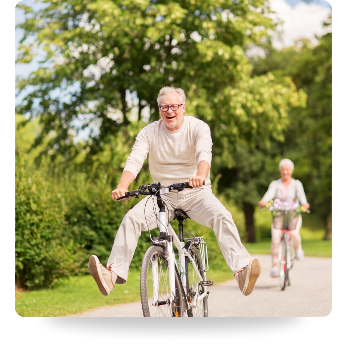 couple riding bike in nature