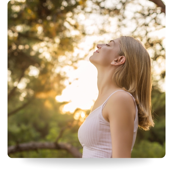 woman breathing in nature